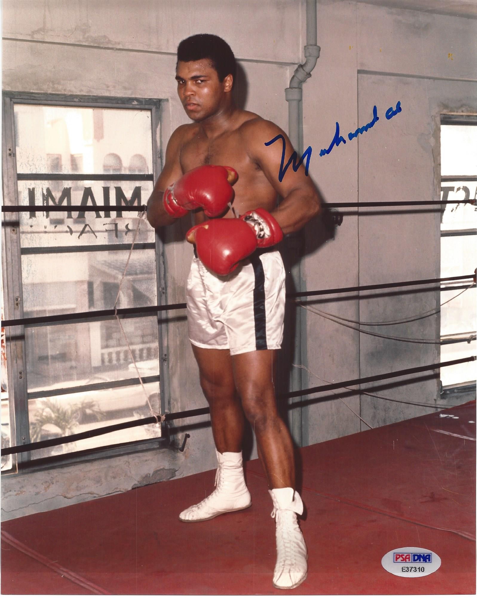 signed 8x10 of Muhammad Ali working out in the gym