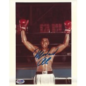 Signed 8x10 of Muhammad Ali raising his gloves after another victory
